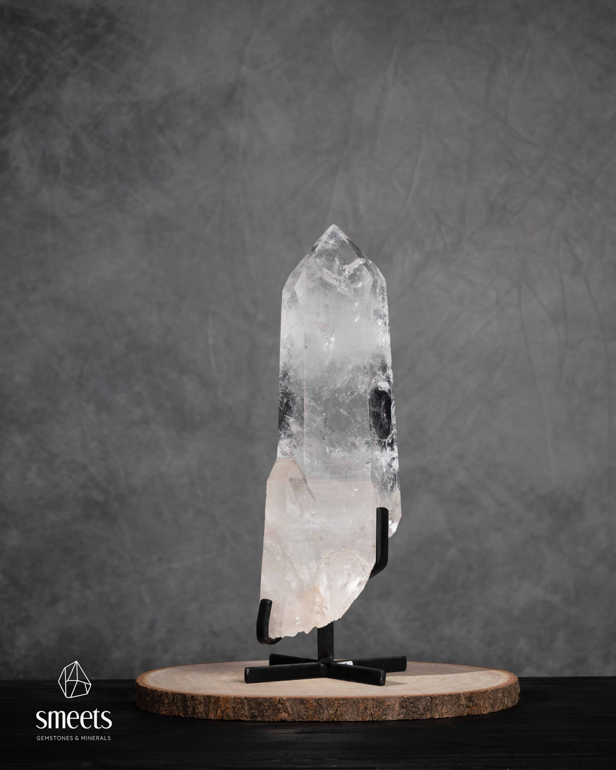 Impressive XL Brazilian Clear Quartz Point on Metal Stand