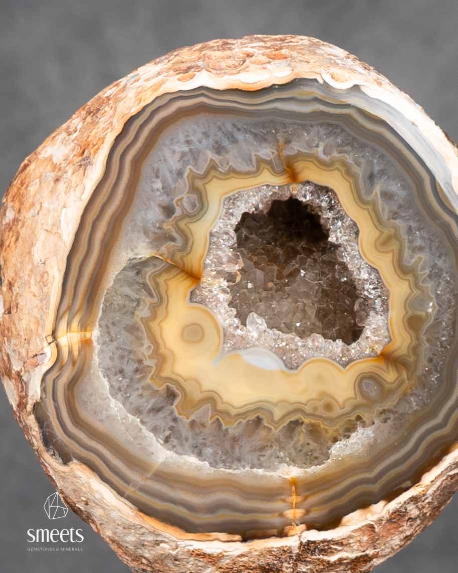 Brazilian Banded Agate Half Geode with Quartz Crystal Cavity on Metal Stand